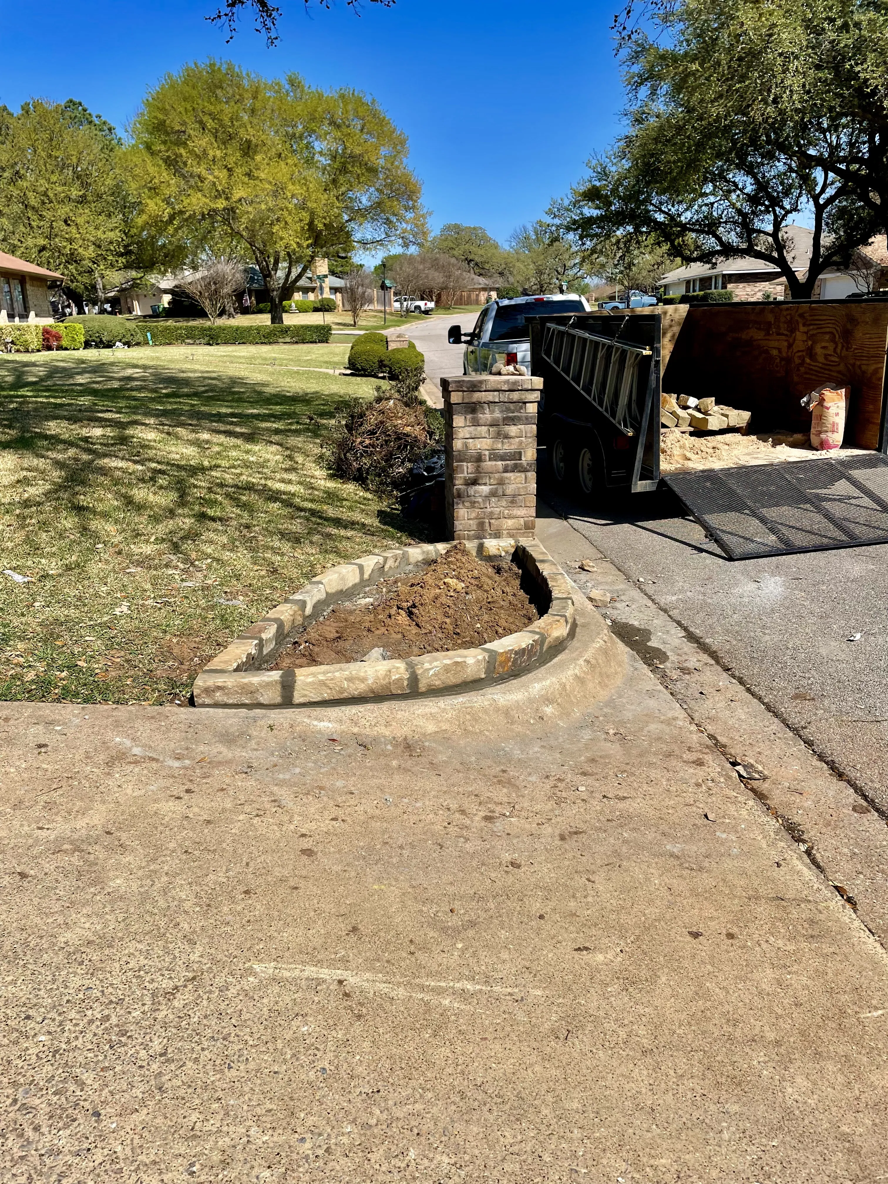 Sierra's Tree Services setting up new flower bed in Southlake, TX