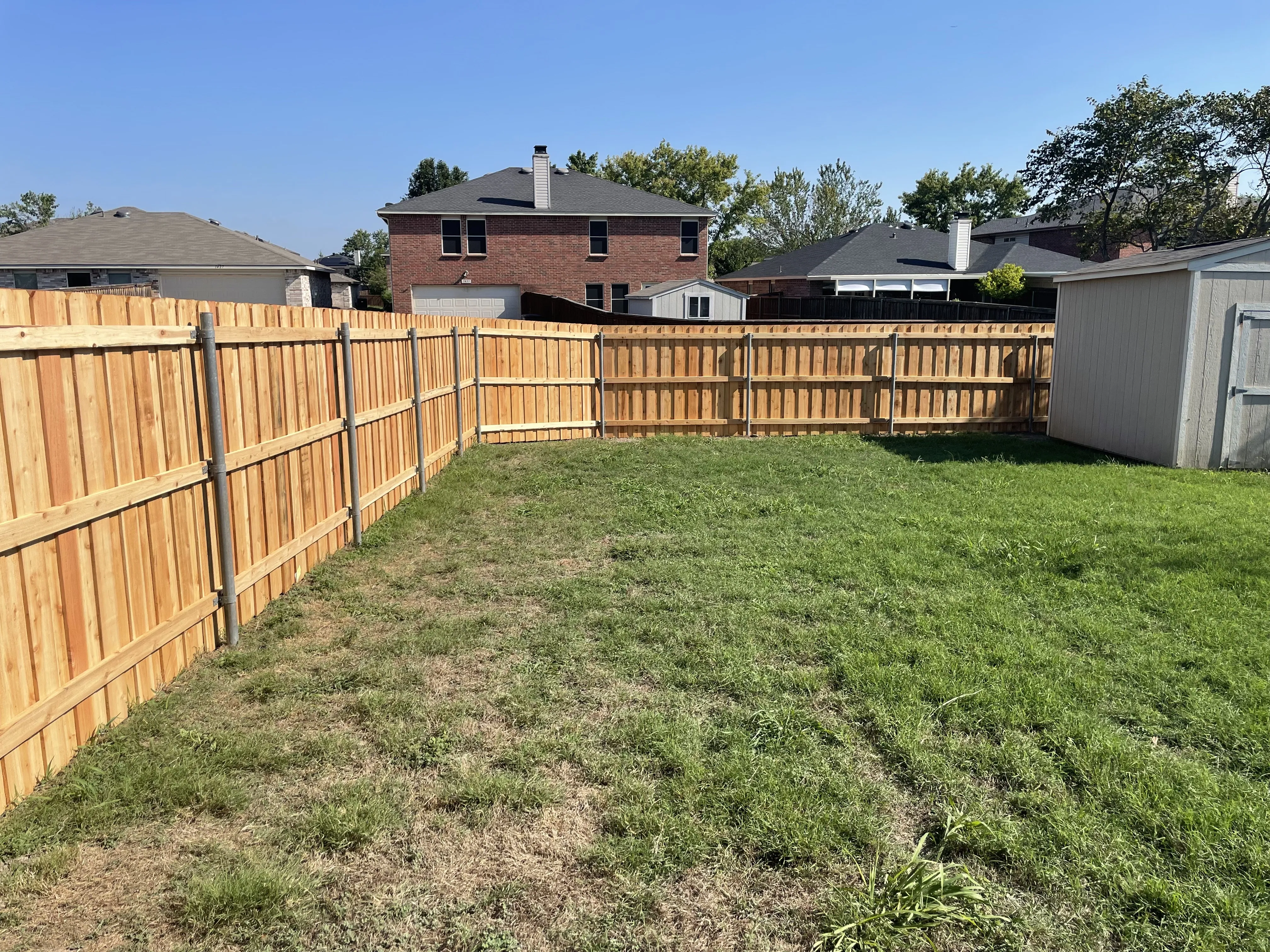 Backyard view of newly installed fence in Euless, TX